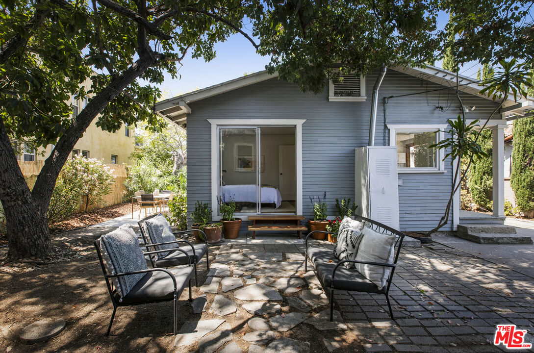 3865 Brunswick Avenue Los Angeles, CA 90039 - Photo 30 of 44 a view of a chairs and table in backyard of the house