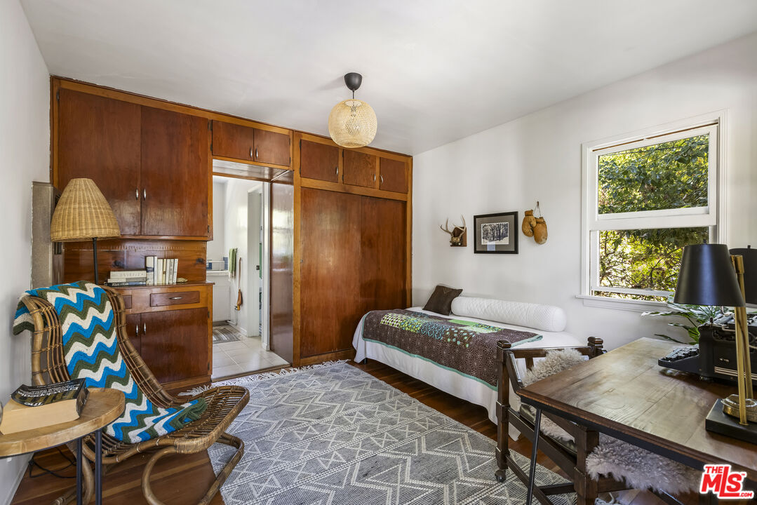 3865 Brunswick Avenue Los Angeles, CA 90039 - Photo 34 of 44 a bedroom with bed and a window