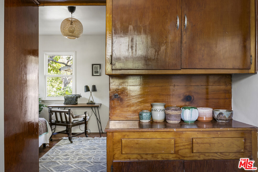 3865 Brunswick Avenue Los Angeles, CA 90039 - Photo 37 of 44 a view of kitchen with cabinets and a potted plant