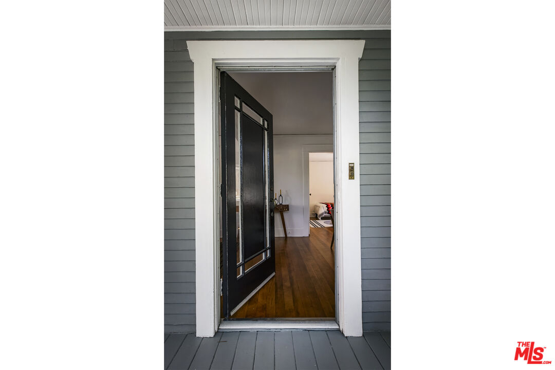 3865 Brunswick Avenue Los Angeles, CA 90039 - Photo 5 of 44 a close view of a room with a door open and a microwave