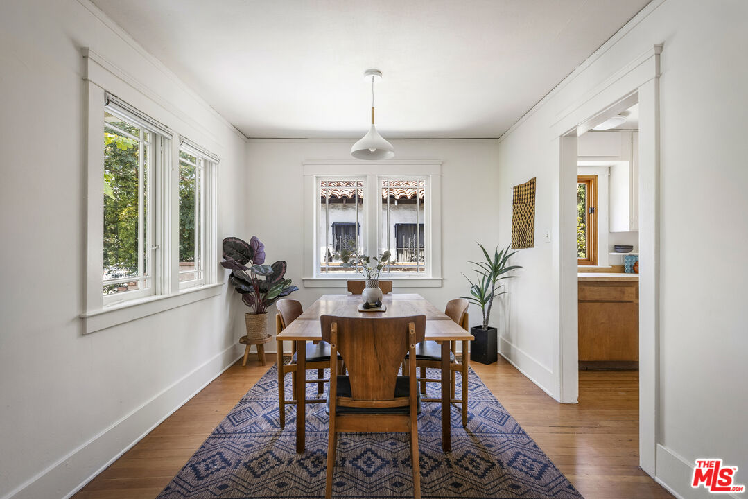 3865 Brunswick Avenue Los Angeles, CA 90039 - Photo 9 of 44 a view of a dining room with furniture window and outside view