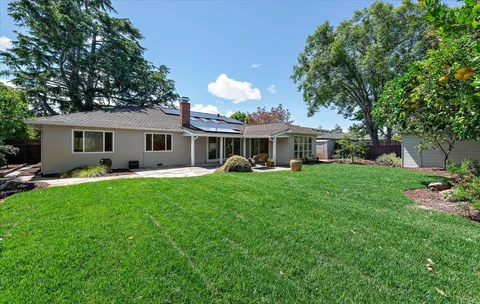 a front view of a house with patio