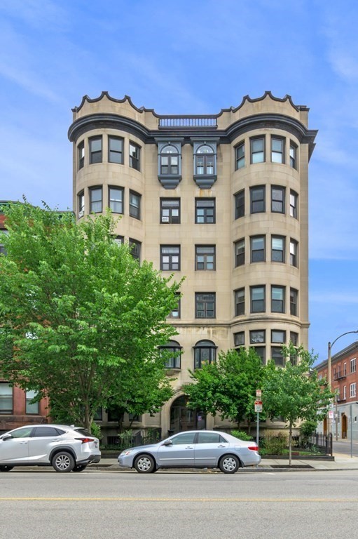 857 Beacon Street, Unit 34 Boston, MA 02215 - Photo 25 of 26 a car parked in front of a building
