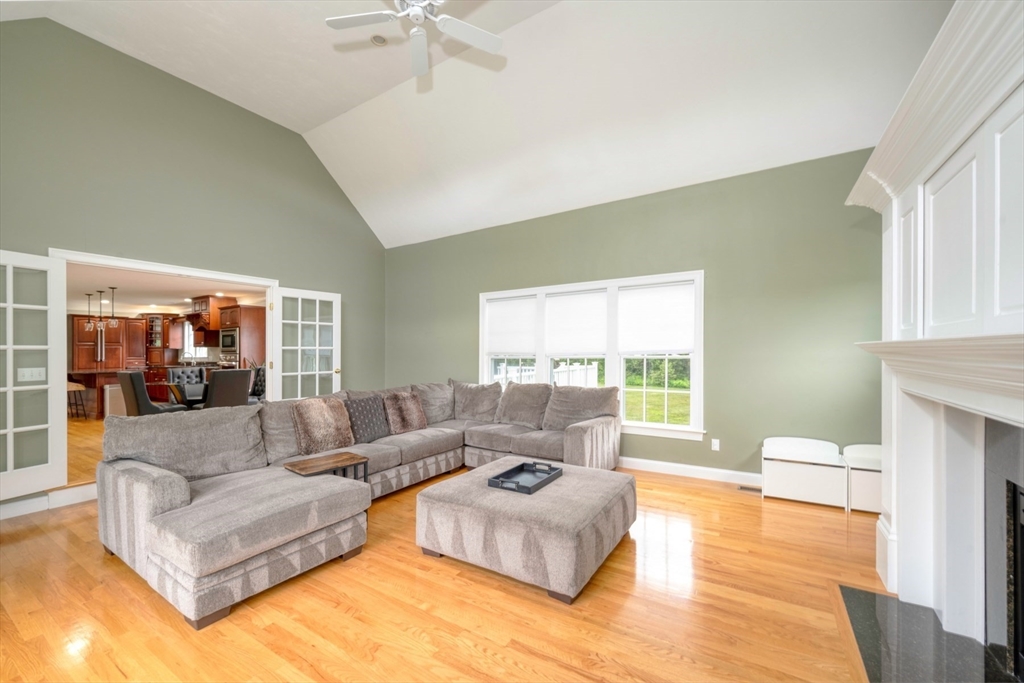 182 Jean Carol Road Abington, MA 02351 - Photo 11 of 38 a living room with furniture and a large window