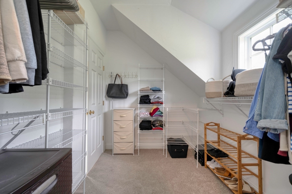 182 Jean Carol Road Abington, MA 02351 - Photo 24 of 38 a kitchen with a refrigerator and a stove top oven