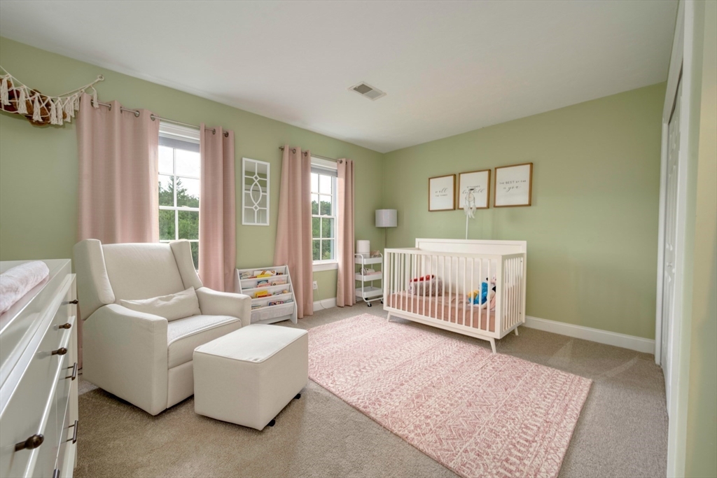 182 Jean Carol Road Abington, MA 02351 - Photo 25 of 38 a living room with furniture and a table