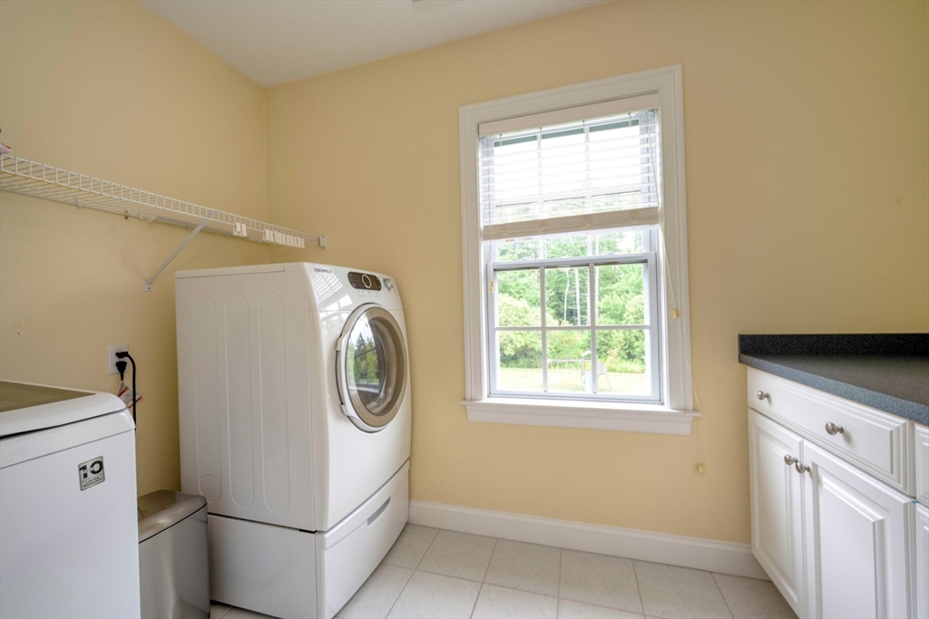 182 Jean Carol Road Abington, MA 02351 - Photo 27 of 38 a utility room with dryer and washer