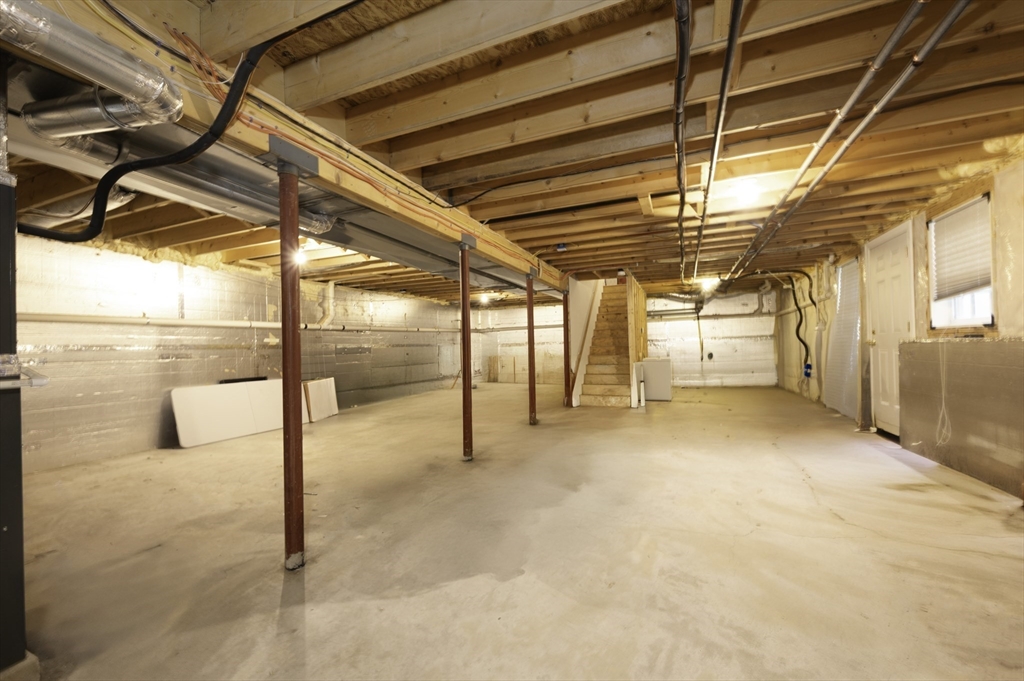 182 Jean Carol Road Abington, MA 02351 - Photo 32 of 38 a view of a indoor garage