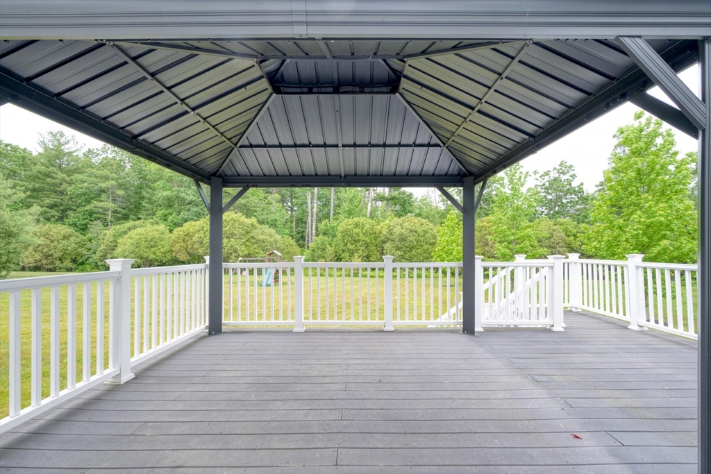 182 Jean Carol Road Abington, MA 02351 - Photo 6 of 38 a view of outdoor space with wooden floor and roof