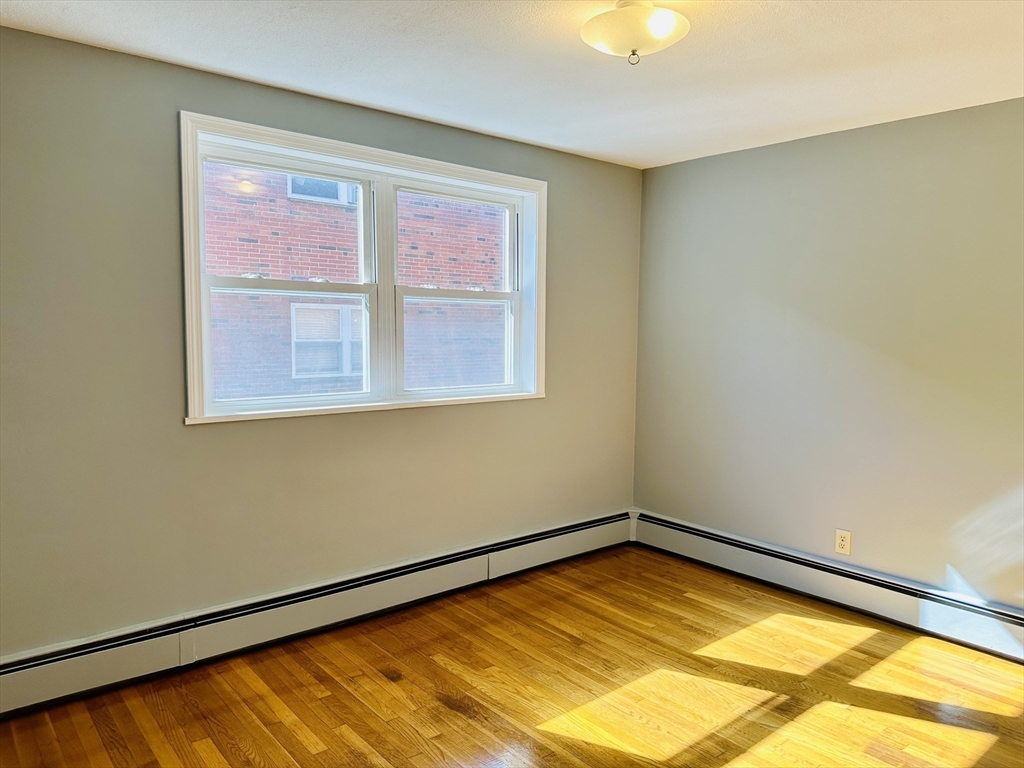 1105 Lexington Street, Unit 84 Waltham, MA 02452 - Photo 7 of 9 a view of a room with a window