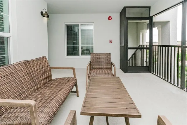 a living room with a couch and a table