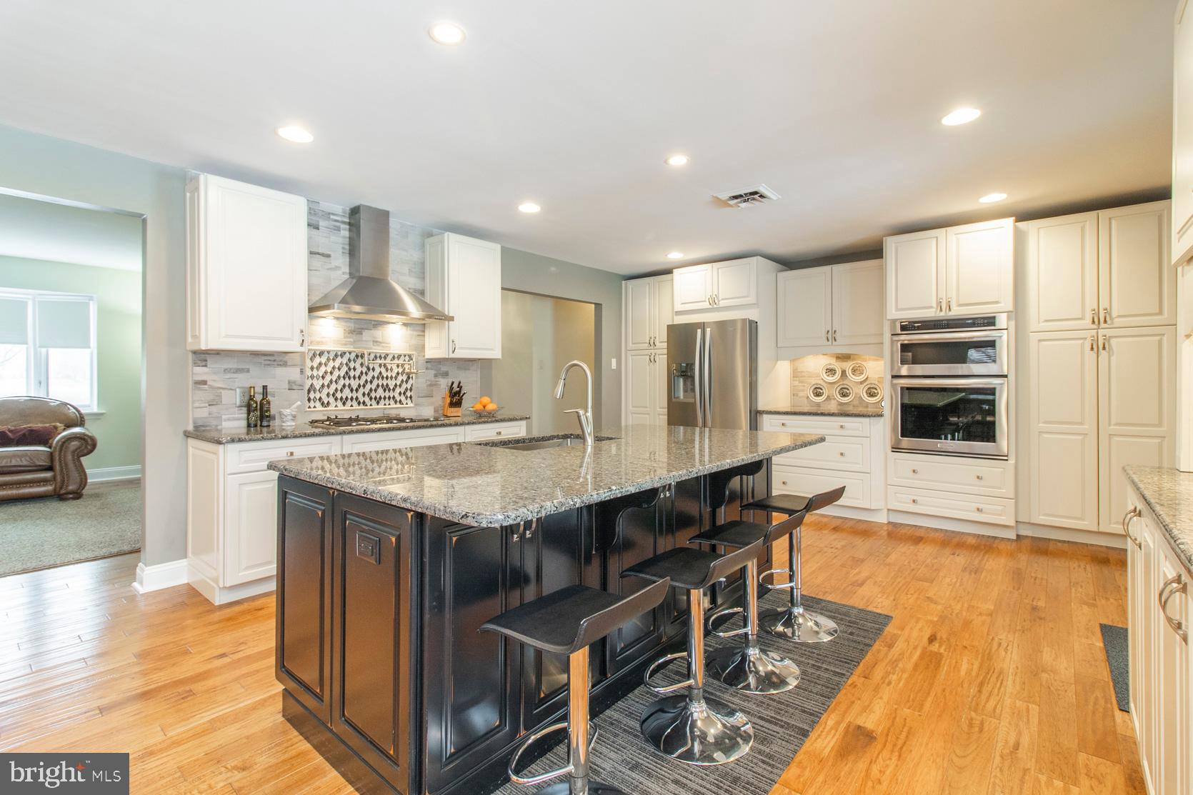 913 Herman Road Horsham, PA 19044 - Photo 8 of 55 Granite island with cabinets and seating