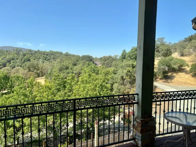 a view of a balcony with outdoor space