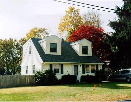 32 Old Barn Road South Stamford, CT 06905 - Photo 1 of 1 a front view of a house with garden