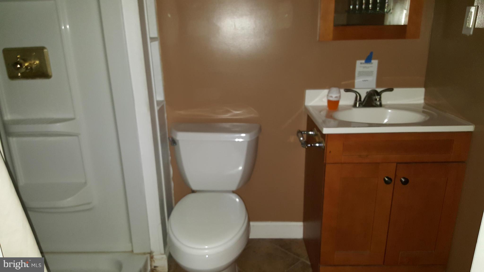 5794 Howellsville Road Front Royal, VA 22630 - Photo 14 of 21 a bathroom with a toilet and a sink