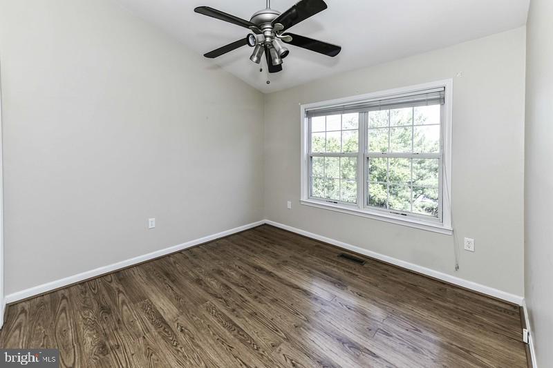 2 Parker Farm Court Silver Spring, MD 20906 - Photo 32 of 34 wooden floor in an empty room with a window