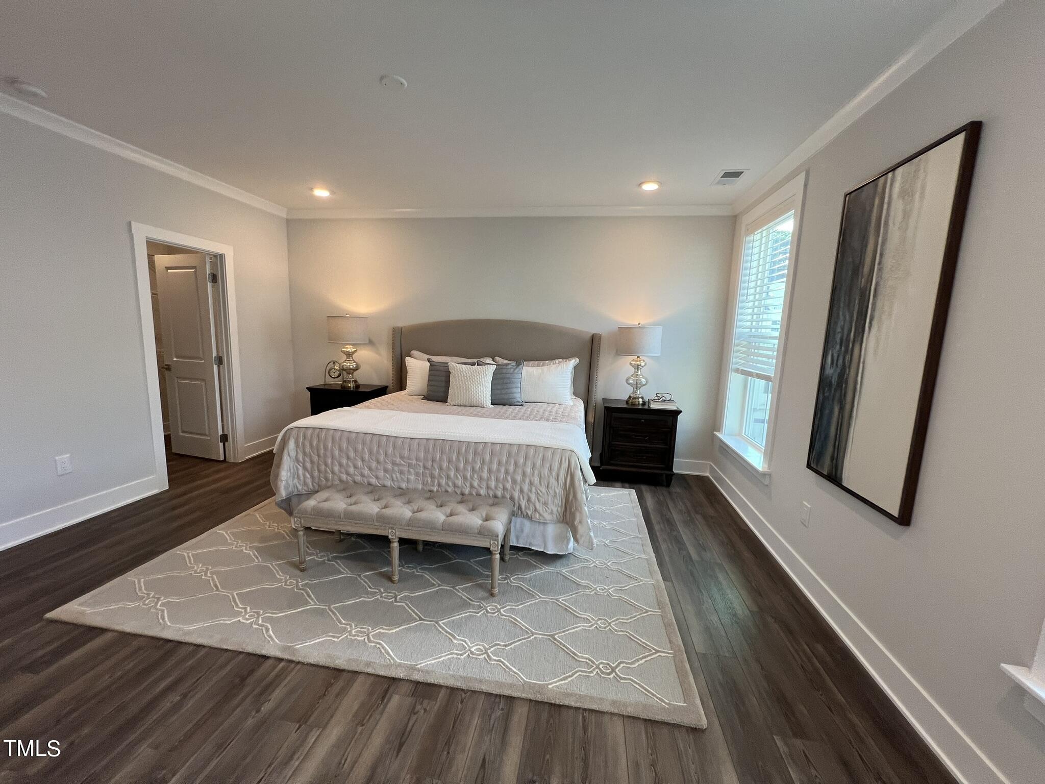 11549 Helmond Way, Unit 102 Raleigh, NC 27617 - Photo 31 of 52 Primary Bedroom from Bath
