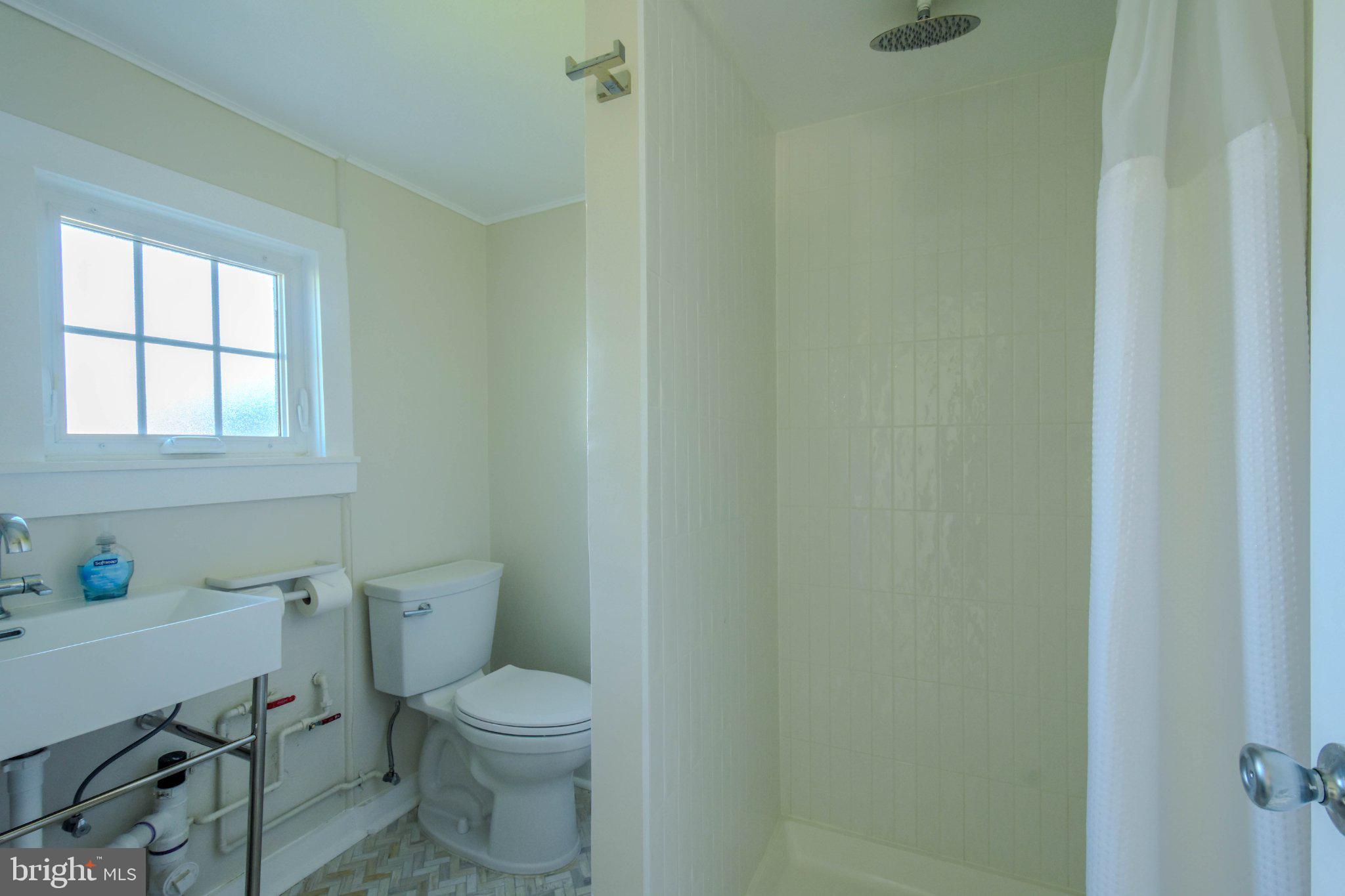 6062 Drum Point Road Deale, MD 20751 - Photo 15 of 17 Bright and airy bathroom retreat.