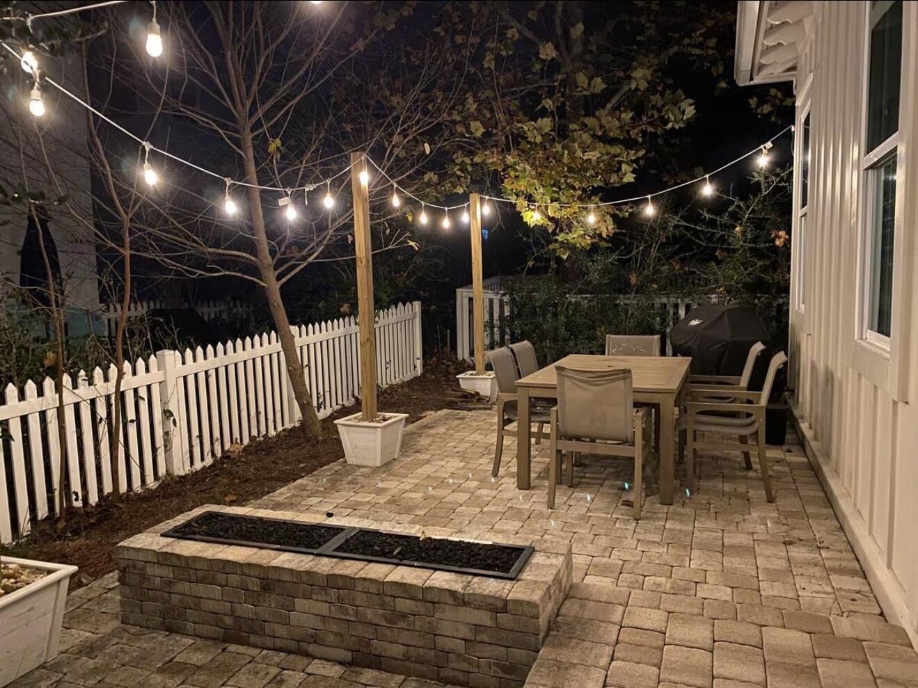 37 Grande Pointe Drive Inlet Beach, FL 32461 - Photo 6 of 58 a outdoor space with lots of tables a garden and a couch