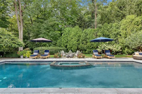 a view of pool with outdoor seating