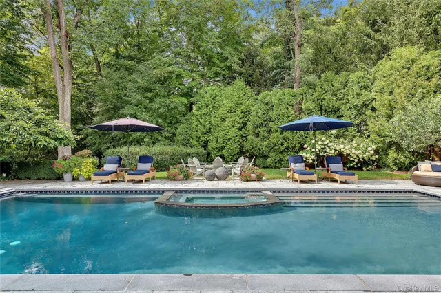 a view of pool with outdoor seating