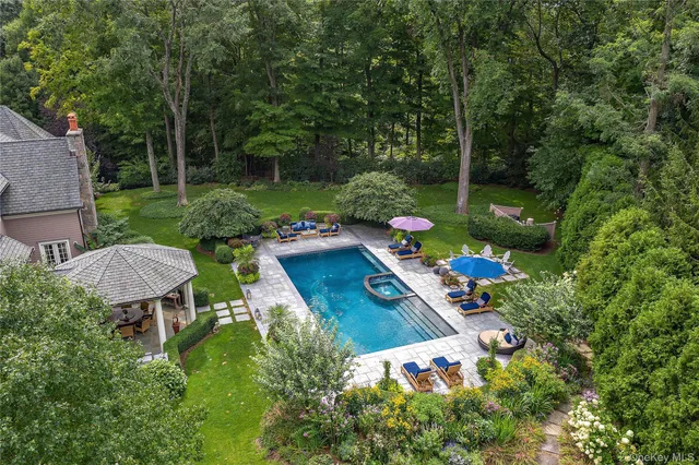 a view of a table and chairs in patio of the house