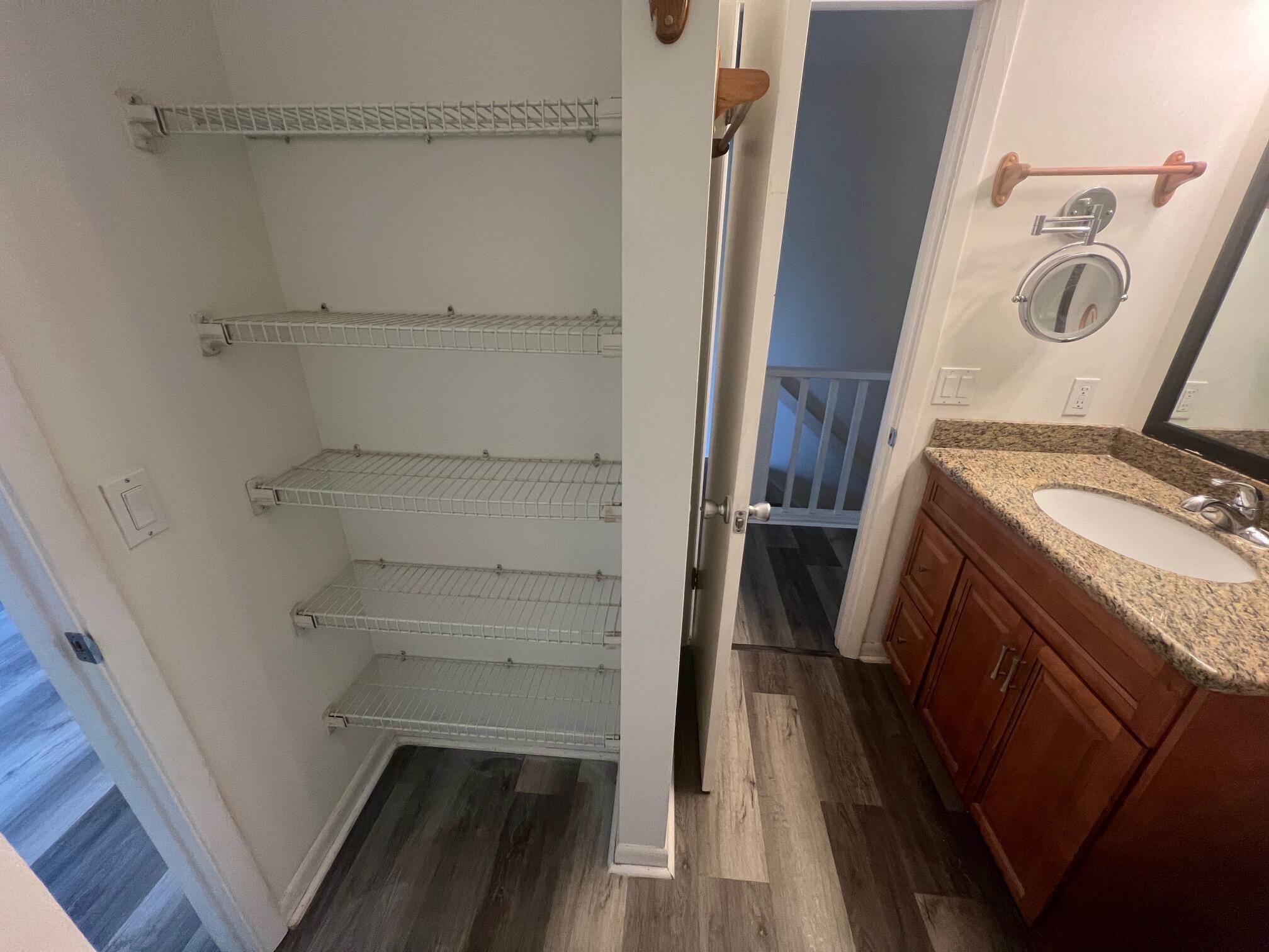 115 Hughes Street Northeast, Unit D4 Fort Walton Beach, FL 32548 - Photo 23 of 29 a bathroom with a sink a washer and dryer