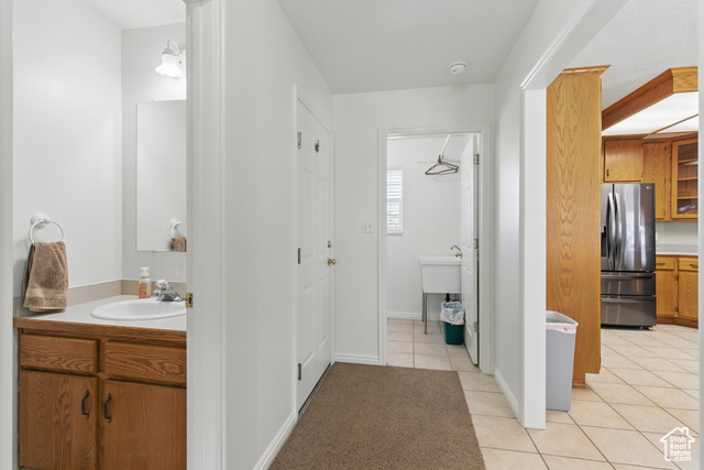 151 South Haulage Road Eureka, UT 84628 - Photo 21 of 36 Bathroom featuring light tile patterned floors and vanity