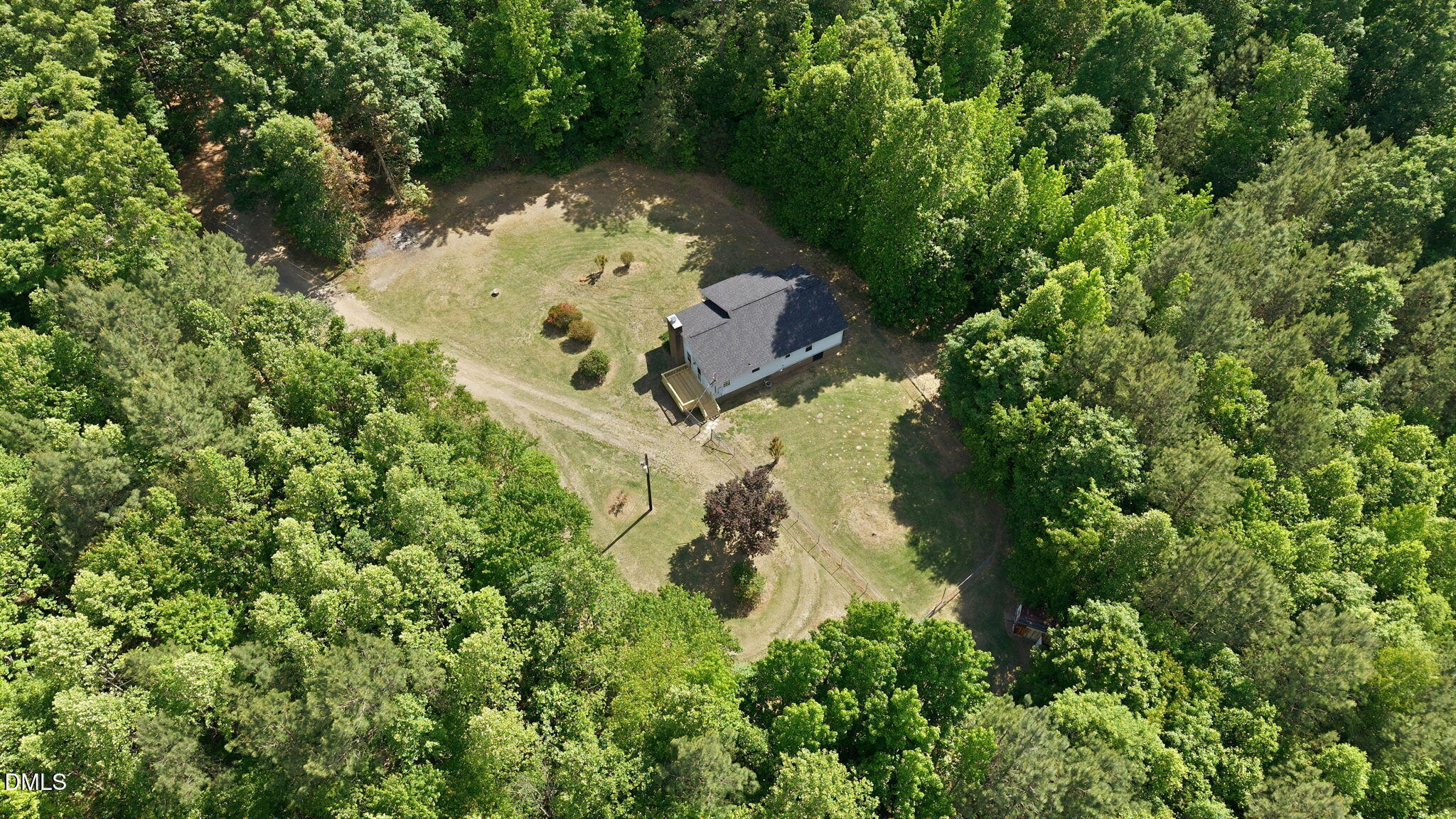 3602 Harrison Road Castalia, NC 27816 - Photo 20 of 48 an aerial view of a house with a yard and large trees
