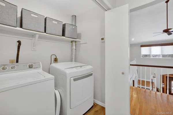 a utility room with dryer and washer