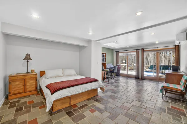 a bedroom with furniture and a couch