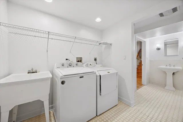 a utility room with dryer and washer