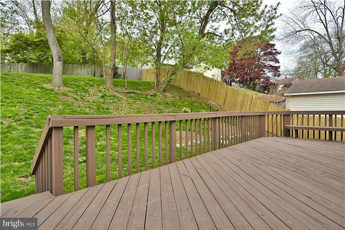 4502 Mahan Road Silver Spring, MD 20906 - Photo 11 of 30 a view of balcony with wooden floor and fence
