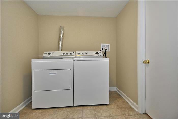 4502 Mahan Road Silver Spring, MD 20906 - Photo 25 of 30 a utility room with dryer and washer