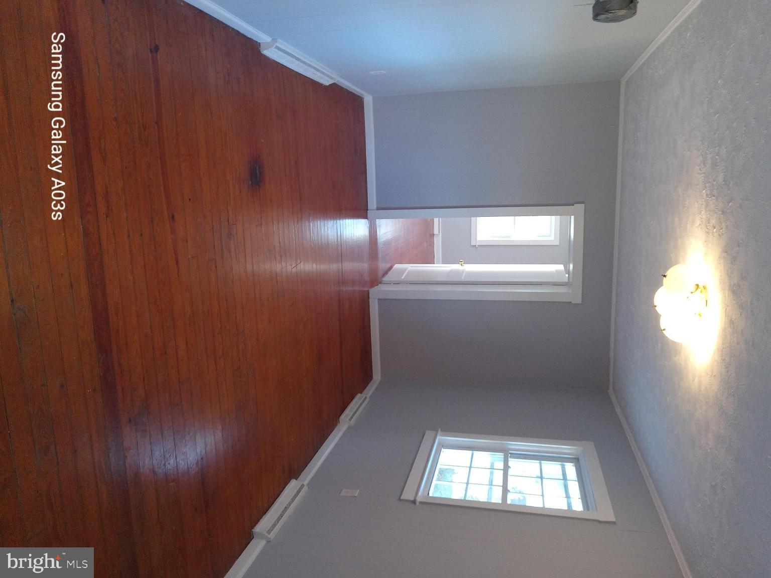 37291 Grass Roots Lane Purcellville, VA 20132 - Photo 27 of 38 a bathroom with a toilet and a window