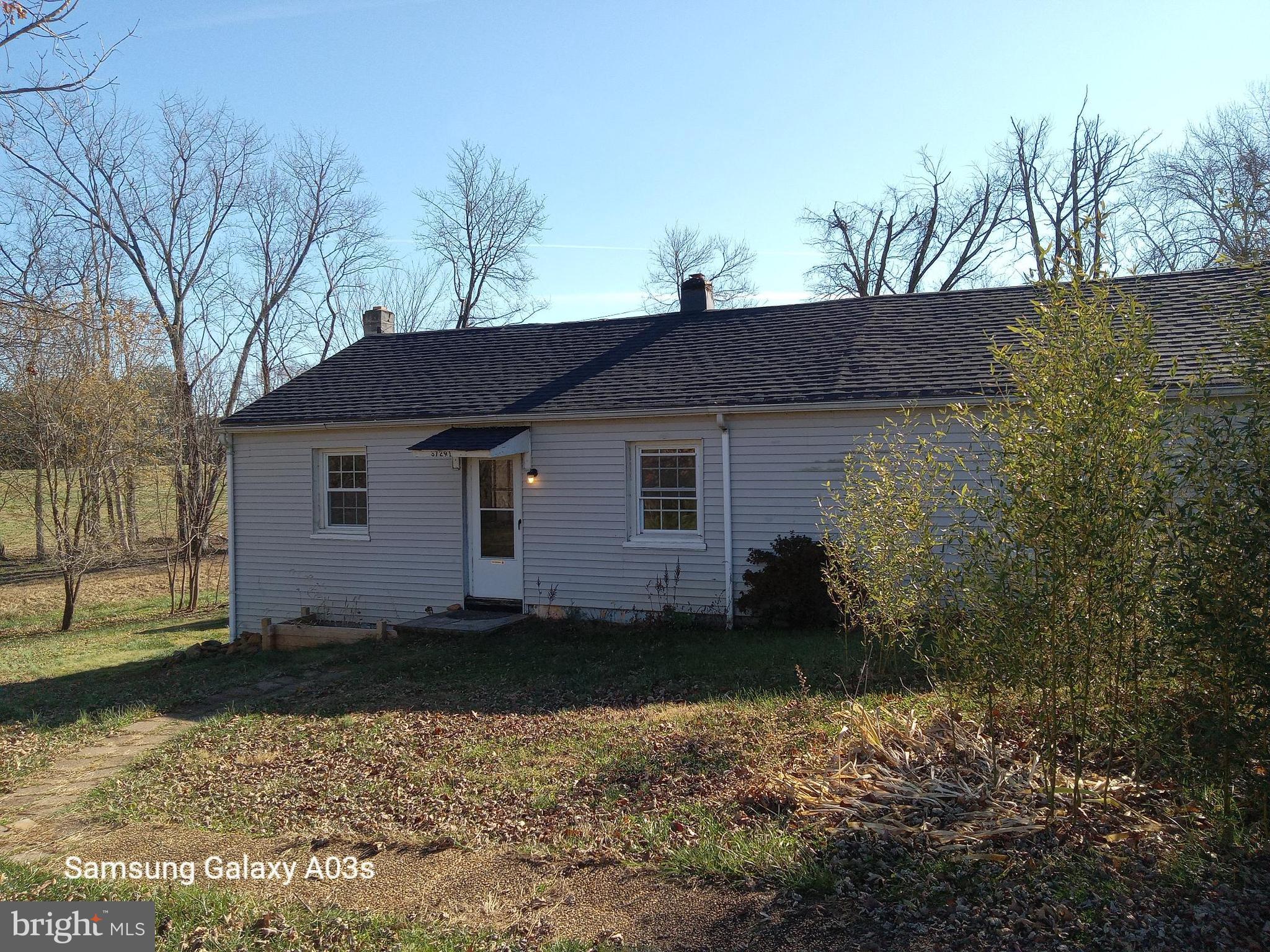 37291 Grass Roots Lane Purcellville, VA 20132 - Photo 32 of 38 a view of a house with a yard