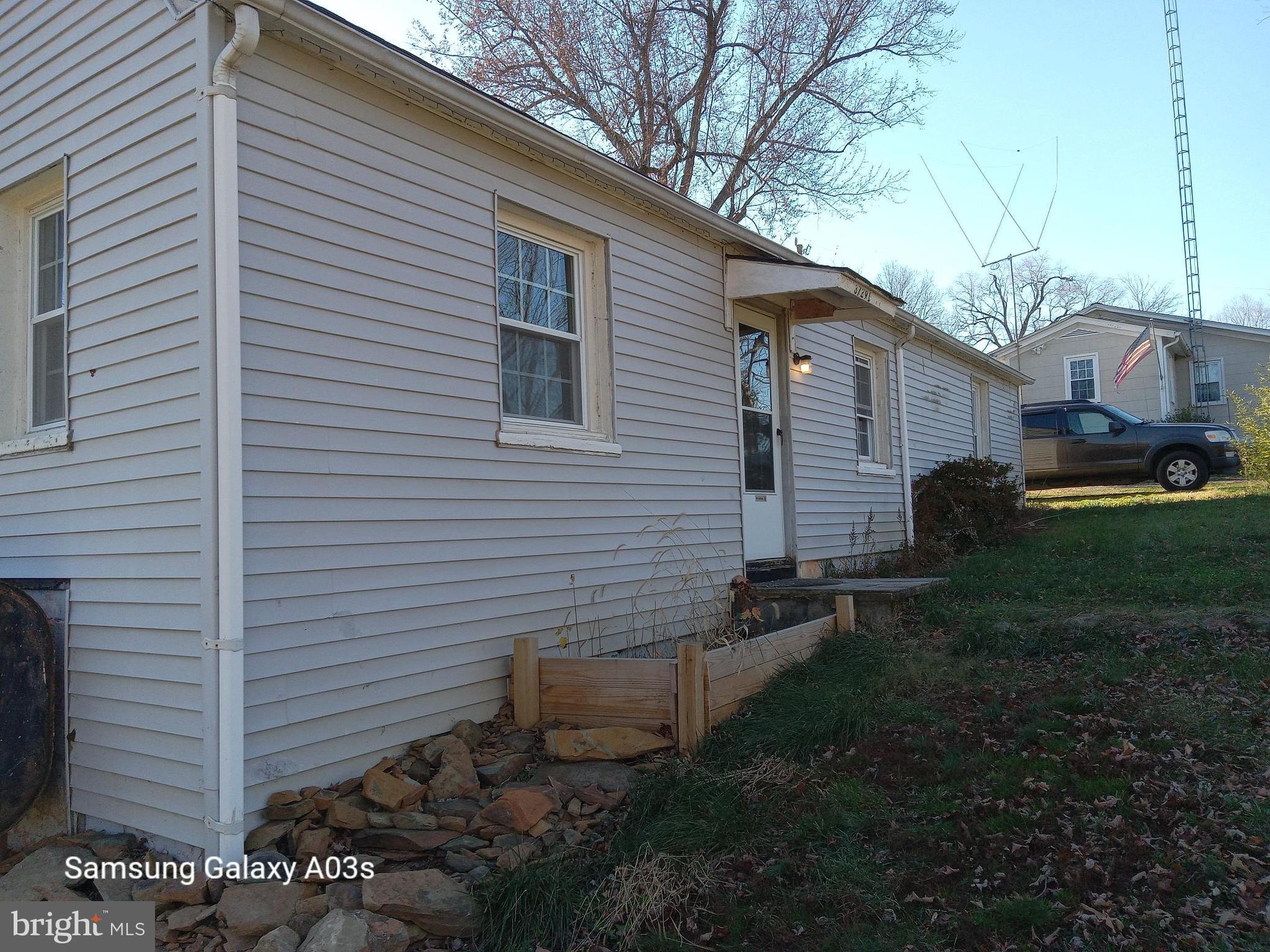 37291 Grass Roots Lane Purcellville, VA 20132 - Photo 34 of 38 a view of a house with a yard