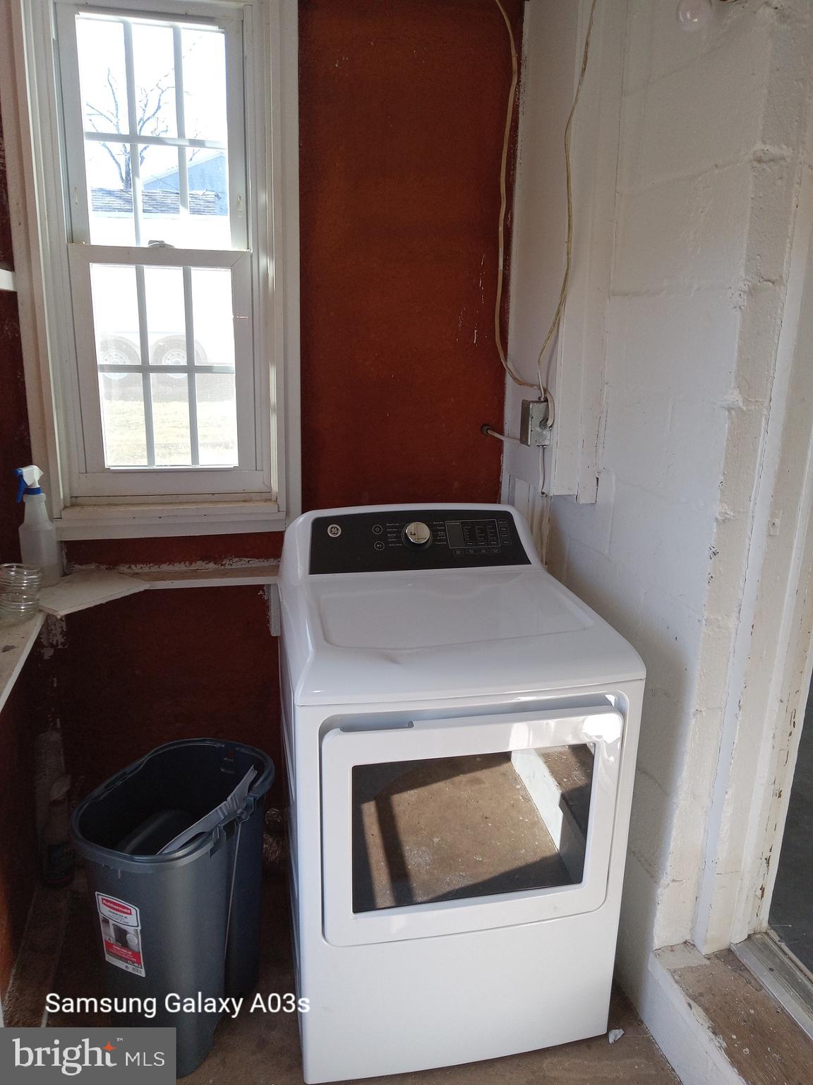 37291 Grass Roots Lane Purcellville, VA 20132 - Photo 38 of 38 a utility room with dryer and washer