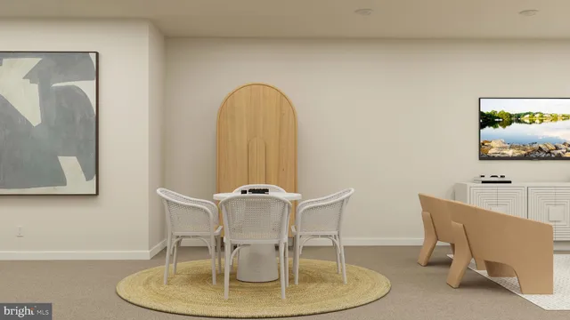 a dining room with furniture and a mirror