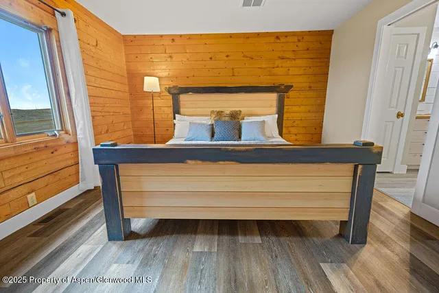 a view of balcony with wooden floor