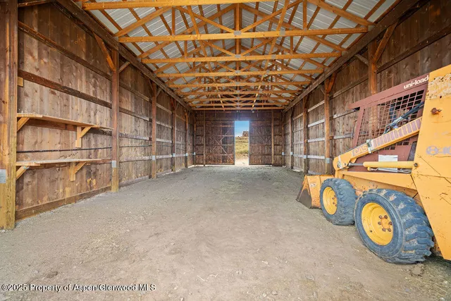 a view of a large body of water with a building in the background