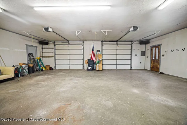 a view of a table and chairs in the ocean