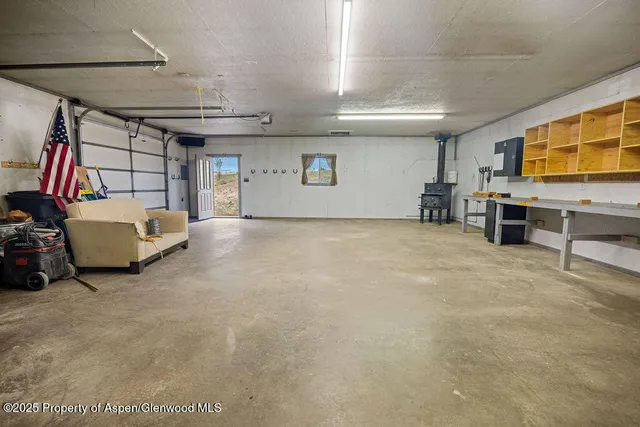 a view of backyard with cabin