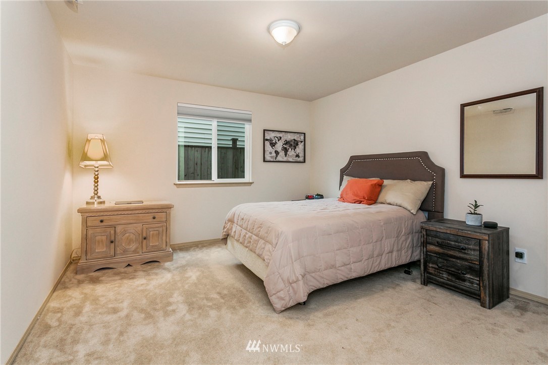 19010 4th Avenue Southeast Bothell, WA 98012 - Photo 14 of 20 a bedroom with bed and window