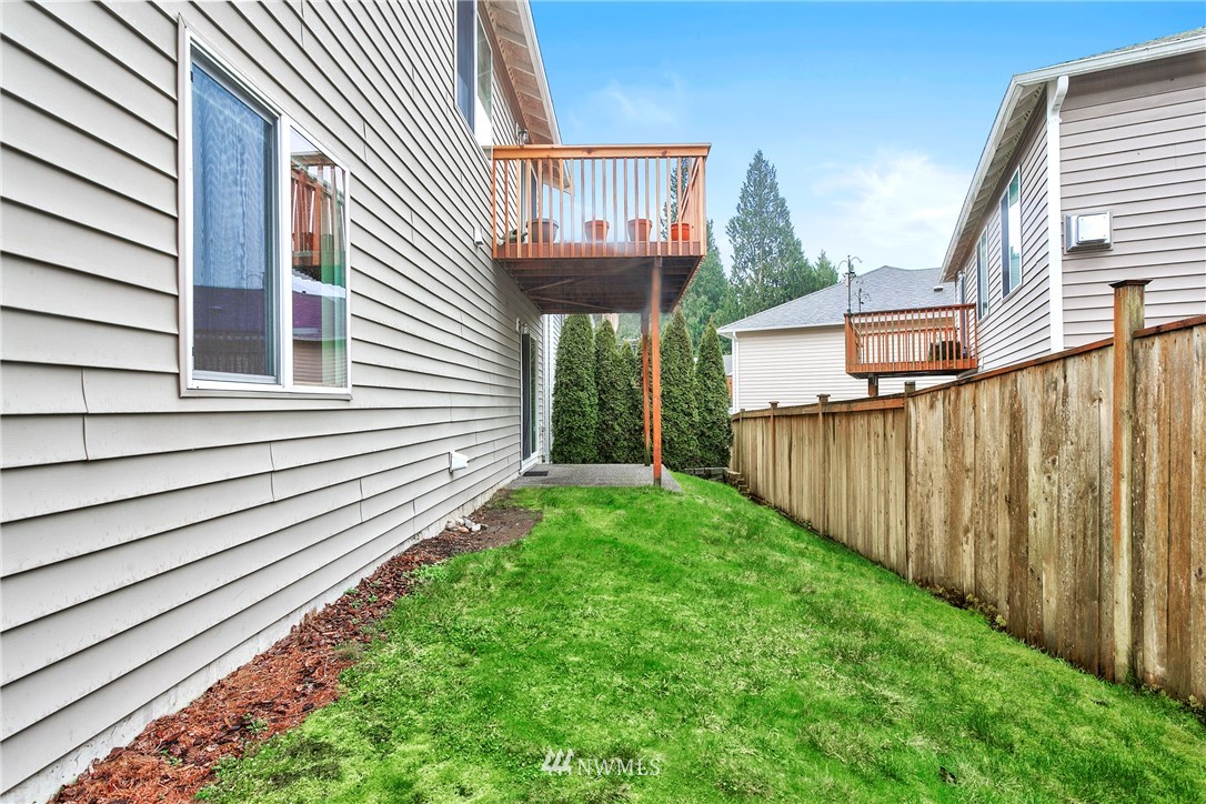 19010 4th Avenue Southeast Bothell, WA 98012 - Photo 20 of 20 a view of a house with backyard and porch