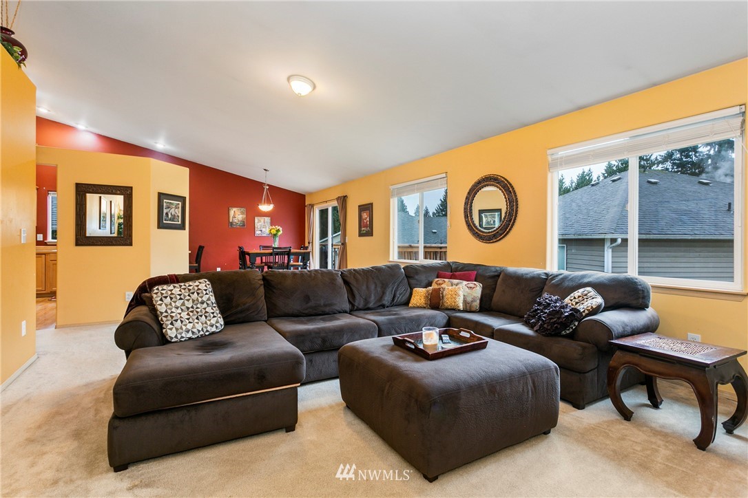 19010 4th Avenue Southeast Bothell, WA 98012 - Photo 5 of 20 a living room with furniture and a large window