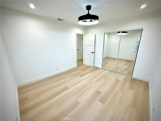 an empty room with a bathroom