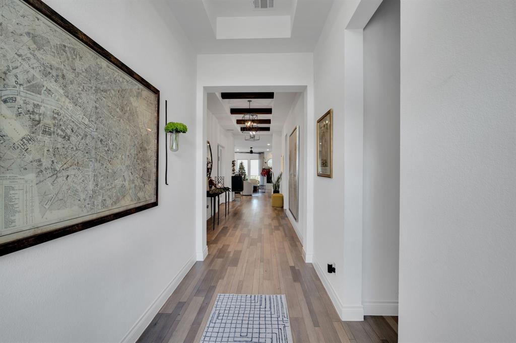 2221 Meridian Place Midlothian, TX 76065 - Photo 5 of 39 a view of a hallway with wooden floor and stairs
