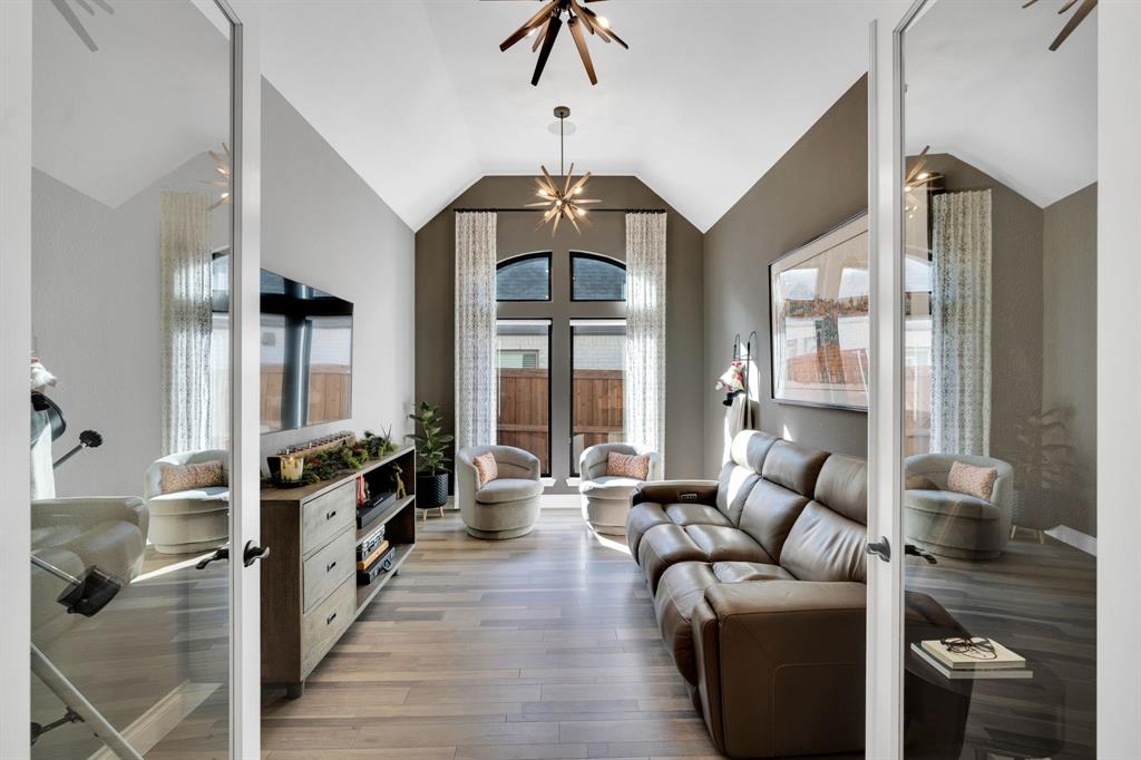 2221 Meridian Place Midlothian, TX 76065 - Photo 8 of 39 a living room with furniture a large window and wooden floor