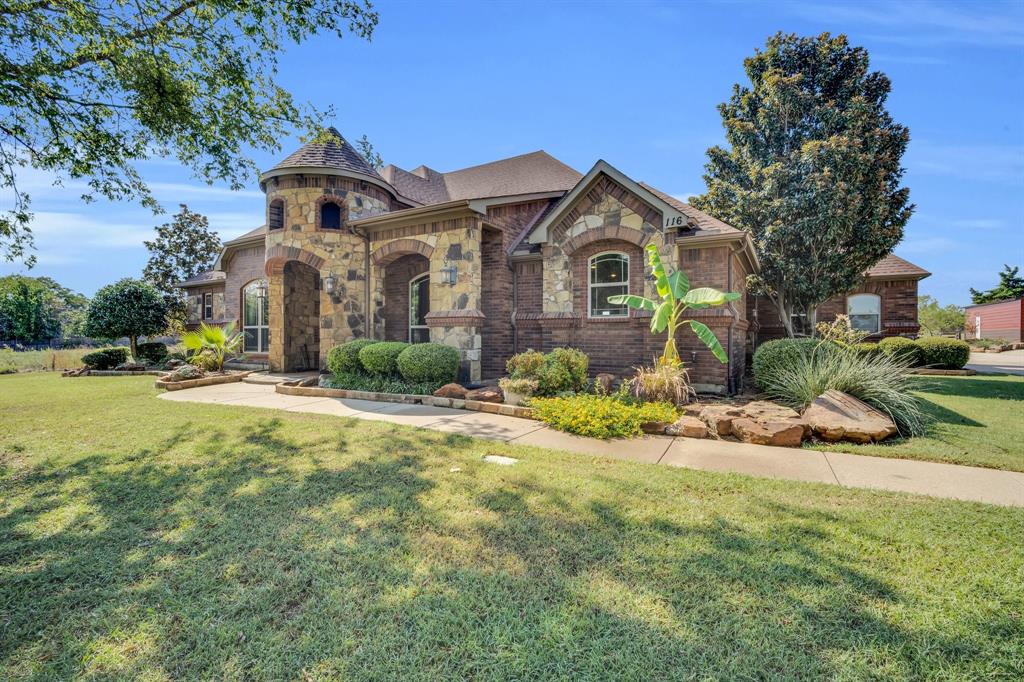 116 Spring Creek Drive Waxahachie, TX 75165 - Photo 1 of 40 View of front facade featuring a front yard